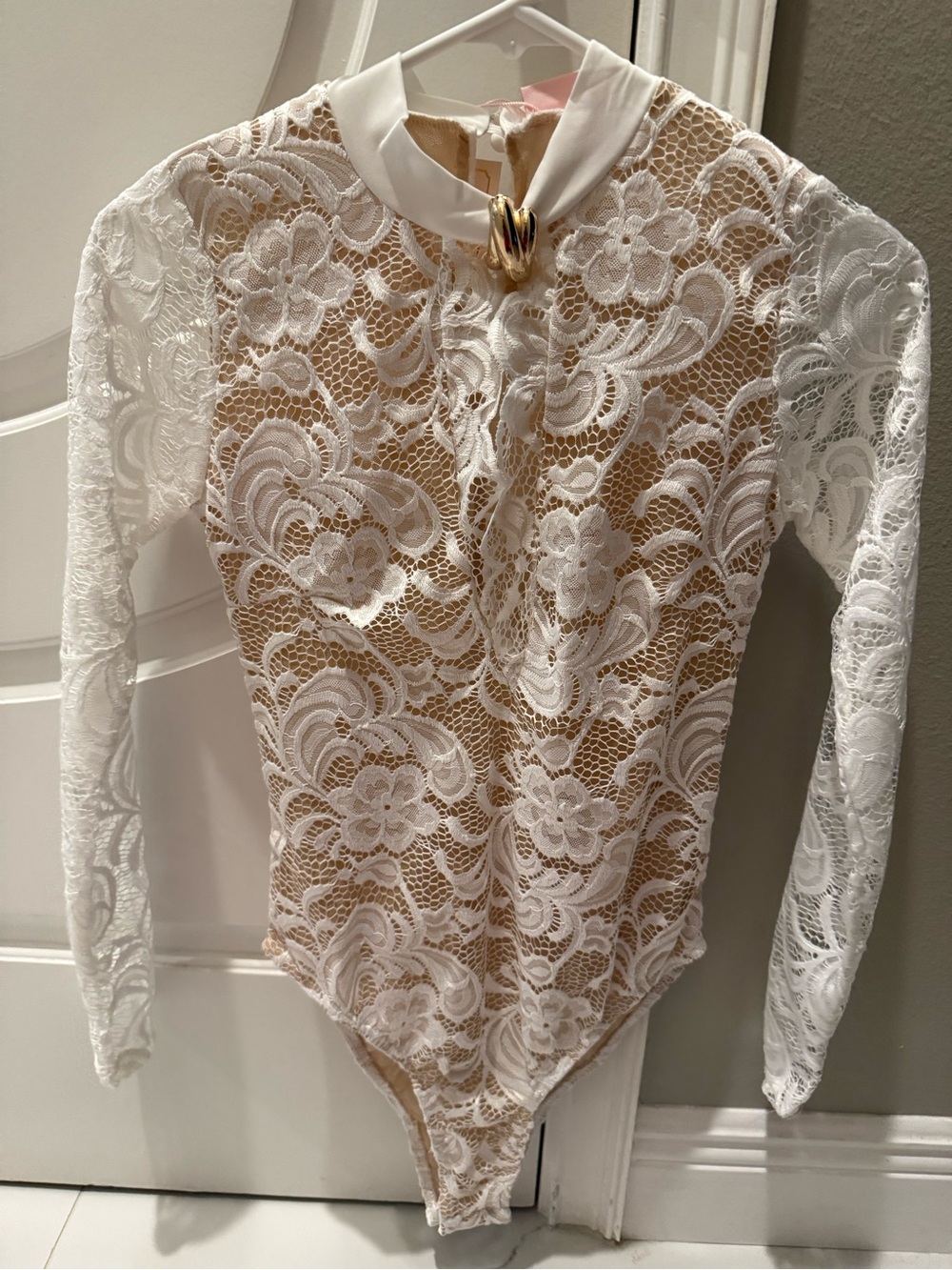 Unlisted White Lace Long-Sleeve Bodysuit with Tan Underdress and Gold Accent